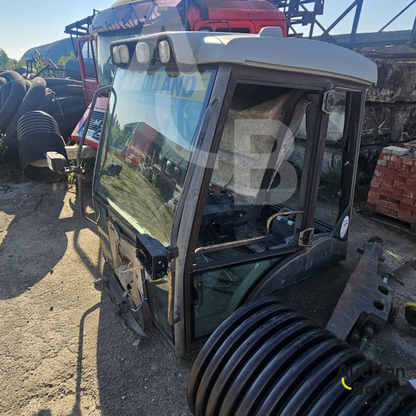 Backhoe loader cabin