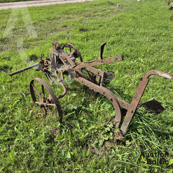 Horse-drawn plow