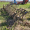 Soil leveling beam